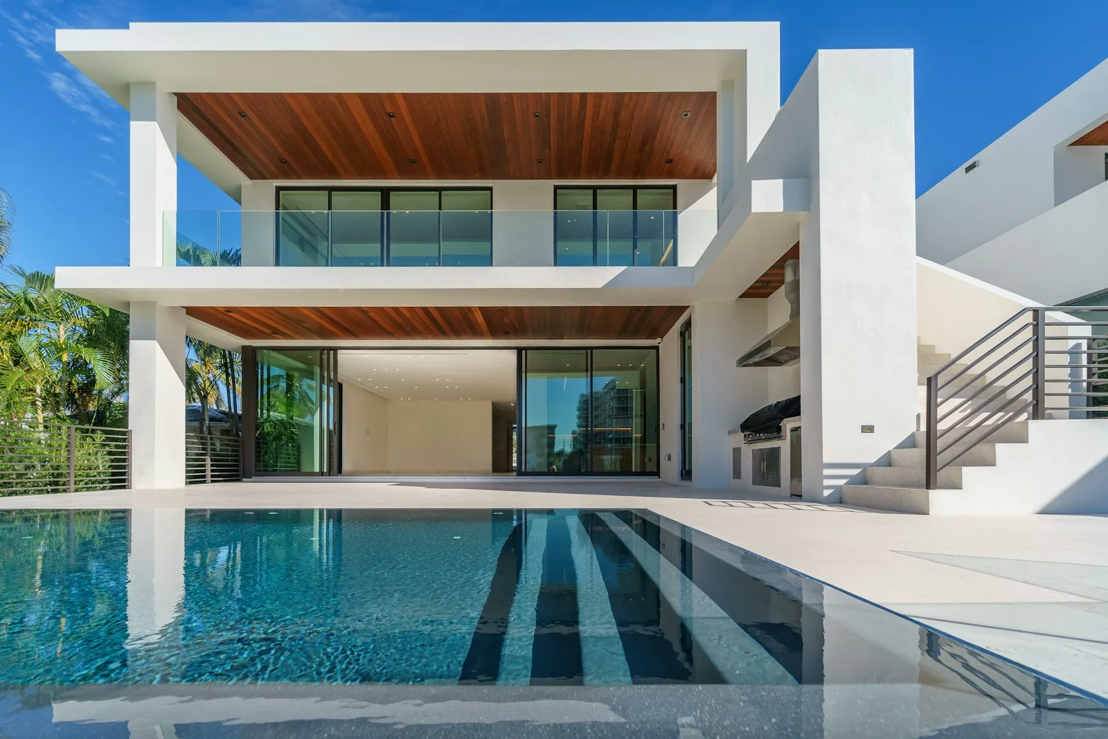 Resort-style pool with tropical landscaping in South Florida